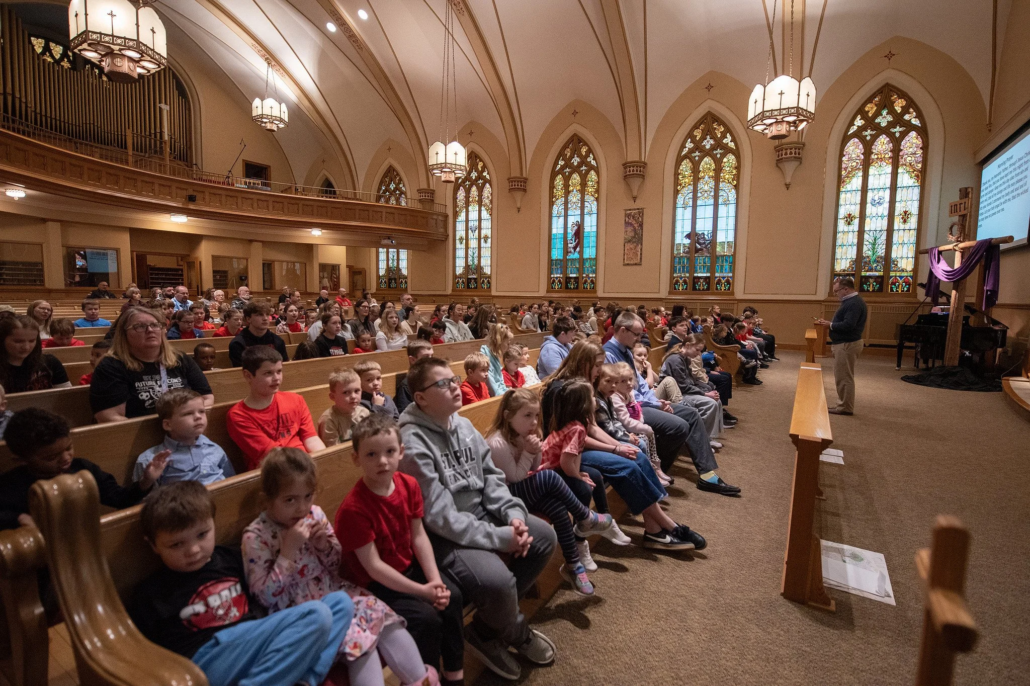 Students gathered in chapel worship at St. Paul Lutheran