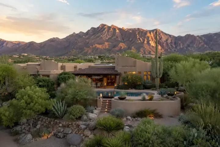 Luxury residence in Ventana Canyon with desert landscaping and mountain views
