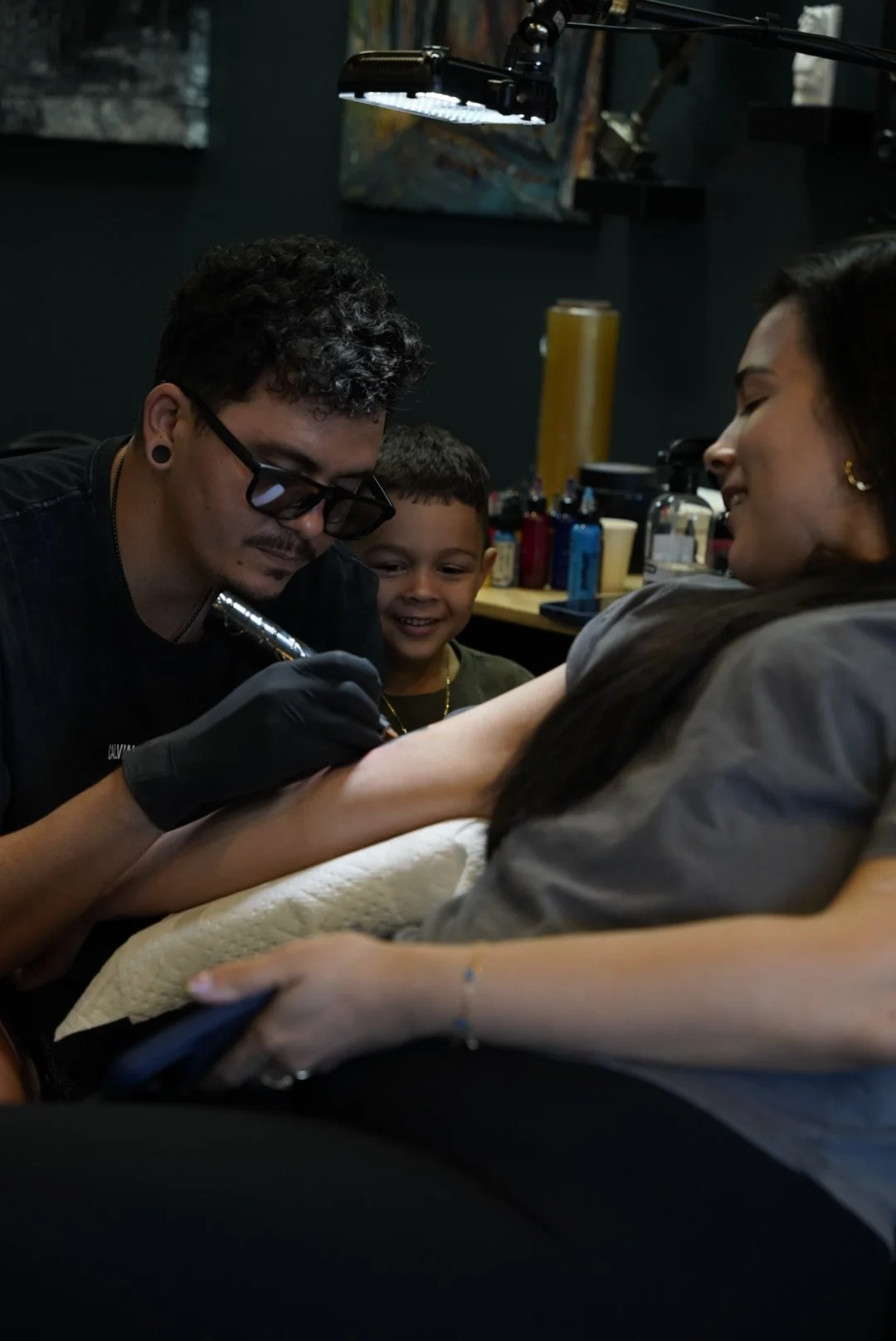 Yorlandi Fabregas tattooing a client at Black Nova Tattoo Collective in Miami