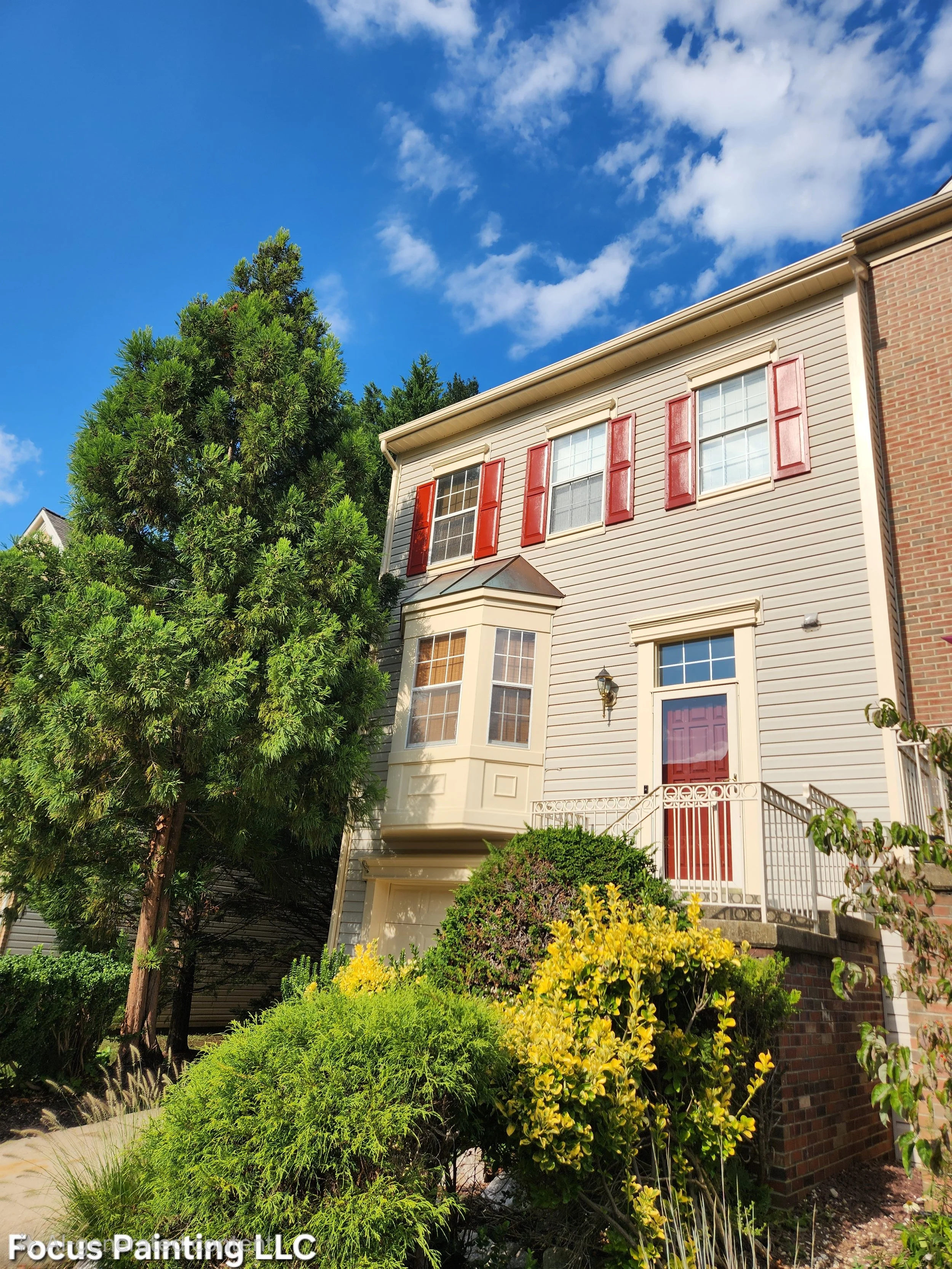 Exterior shutter painting by Focus Painting in Maryland
