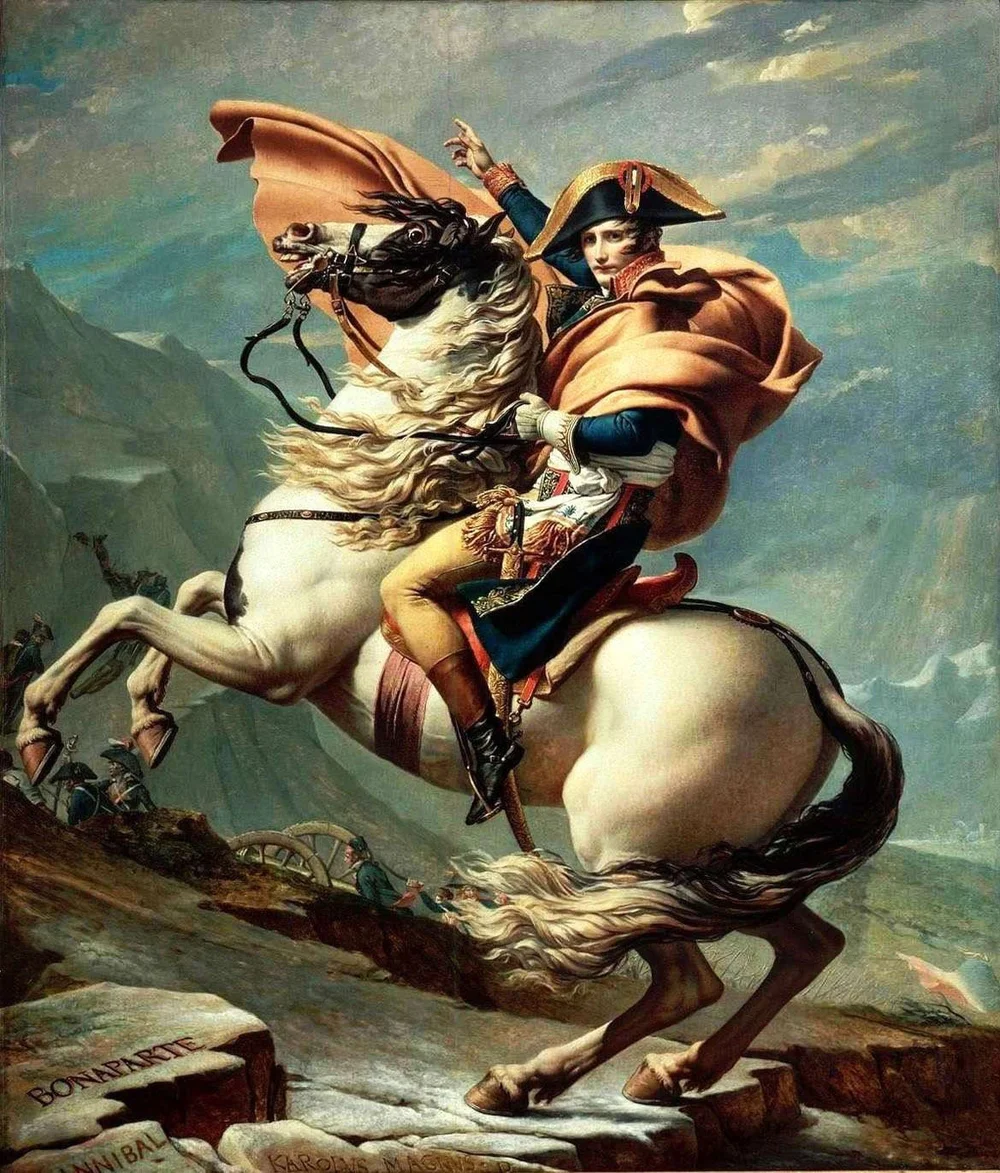 Bonaparte in an ochre cloak points forward from a rearing horse; the names Bonaparte, Hannibal and Karolus Magnus are inscribed on the rocks.