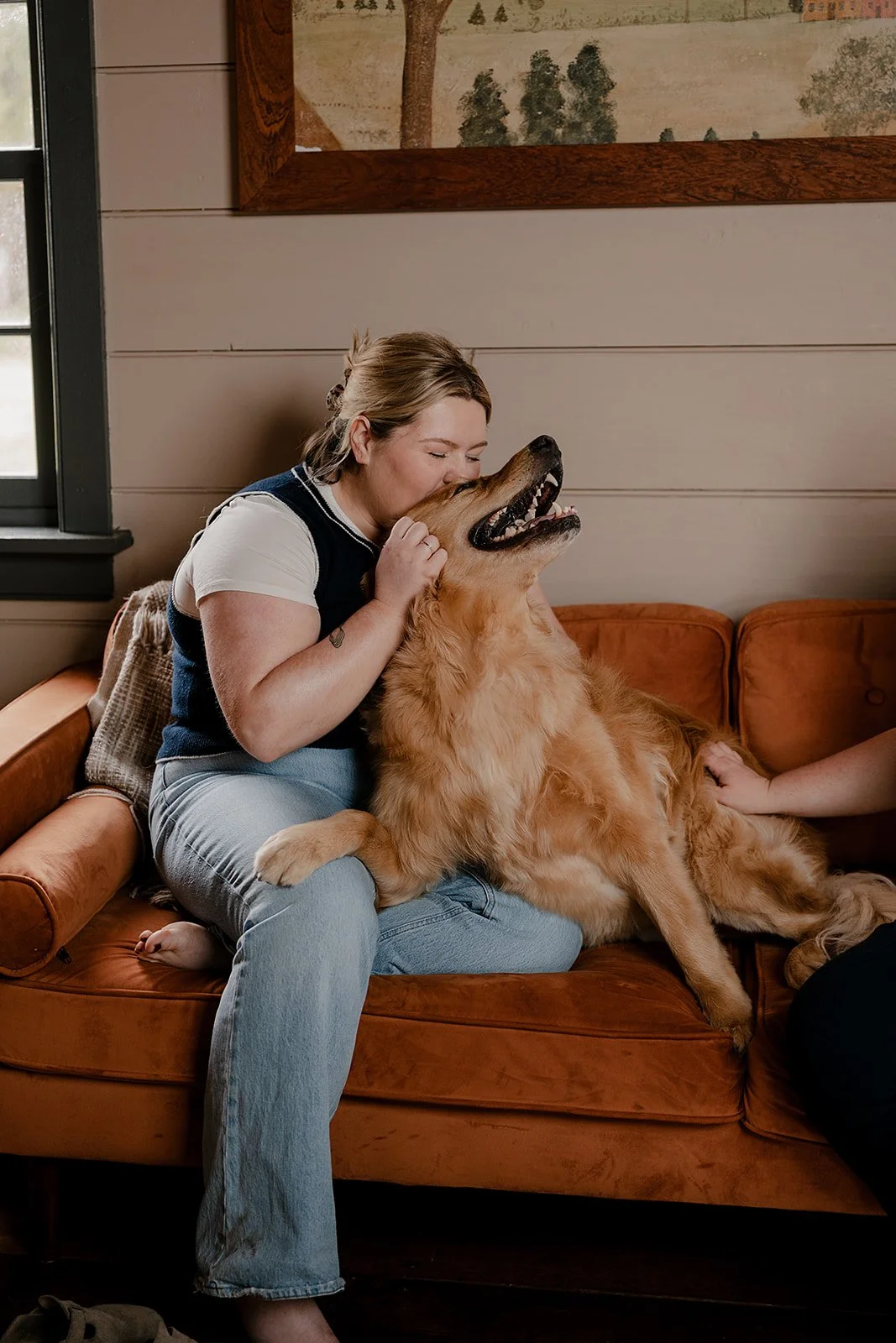 Alison Swiggard with her golden retriever, Goose