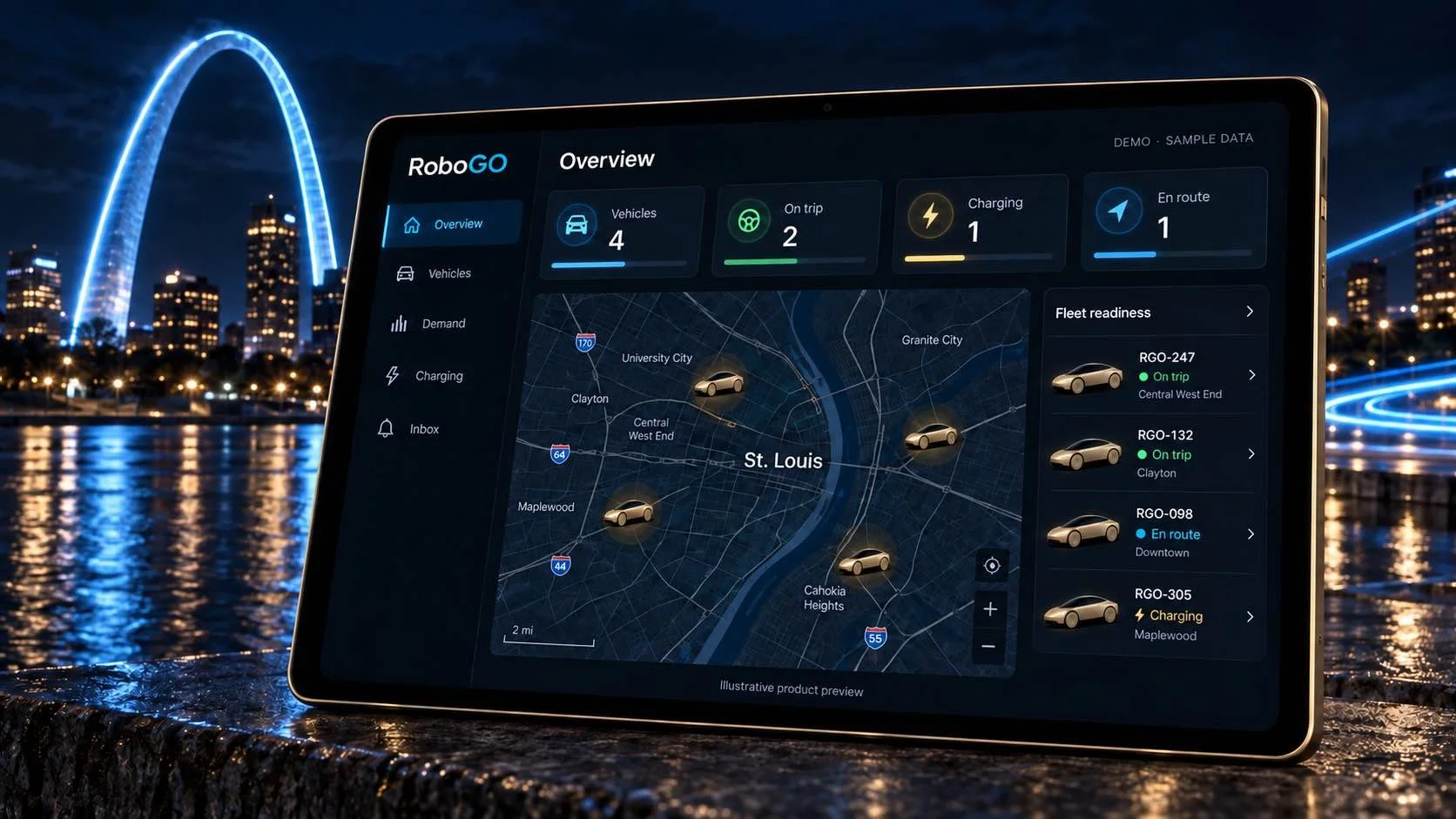 RoboGO Fleet OS concept displayed on a tablet with the illuminated Gateway Arch behind it