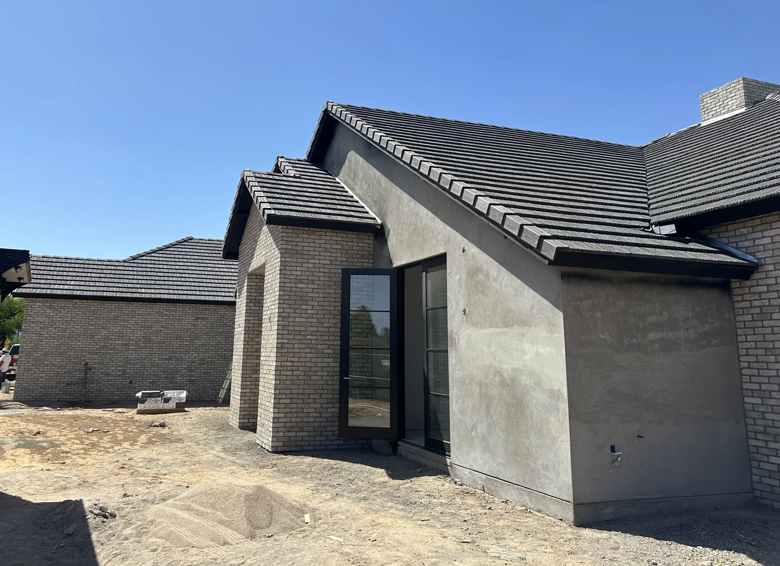 New construction concrete tile roof with exposed underlayment detail on a Paradise Valley Arizona home