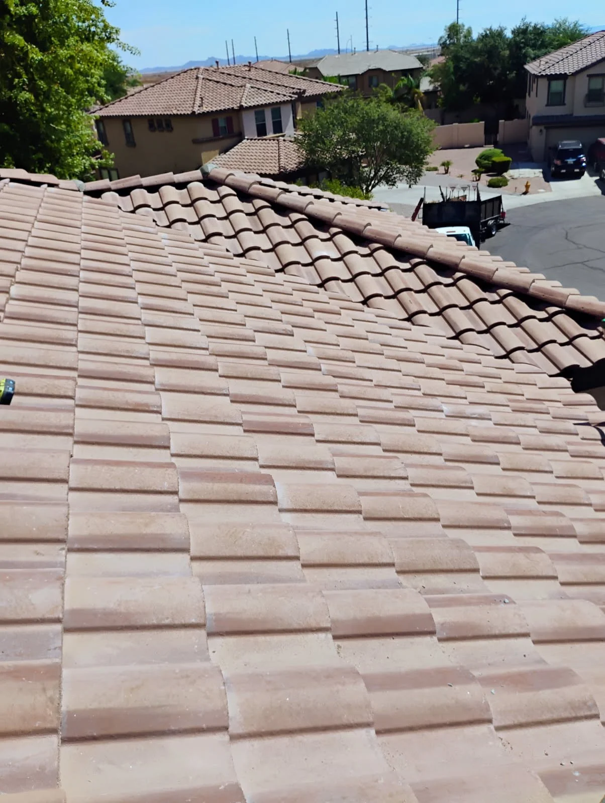 Arizona tile roof under clear desert sky