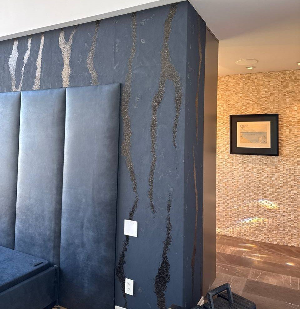 Phillip Jeffries wallcovering turning around an outside corner in the Boulder bedroom.