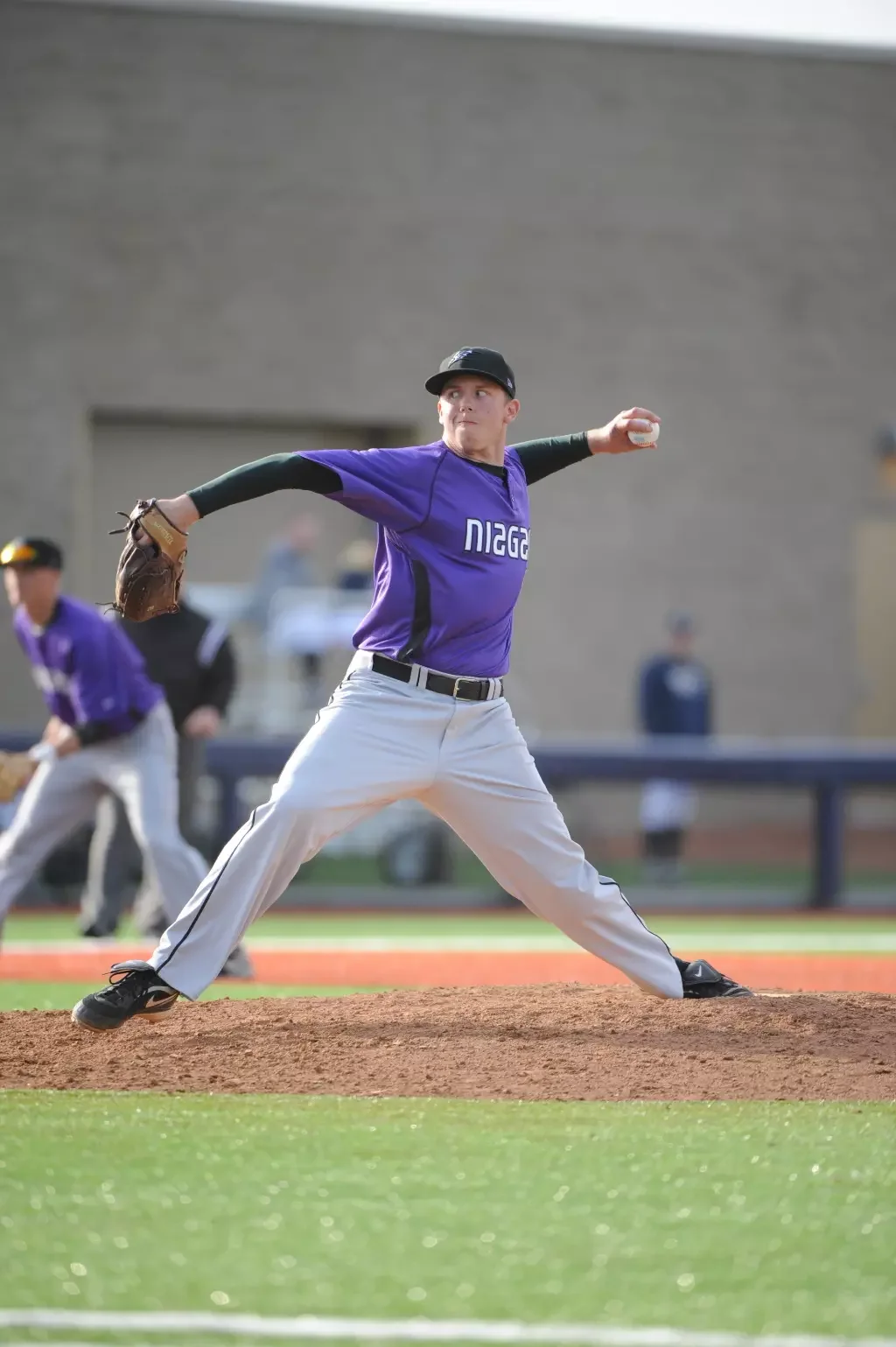 Coach Fort delivering a pitch