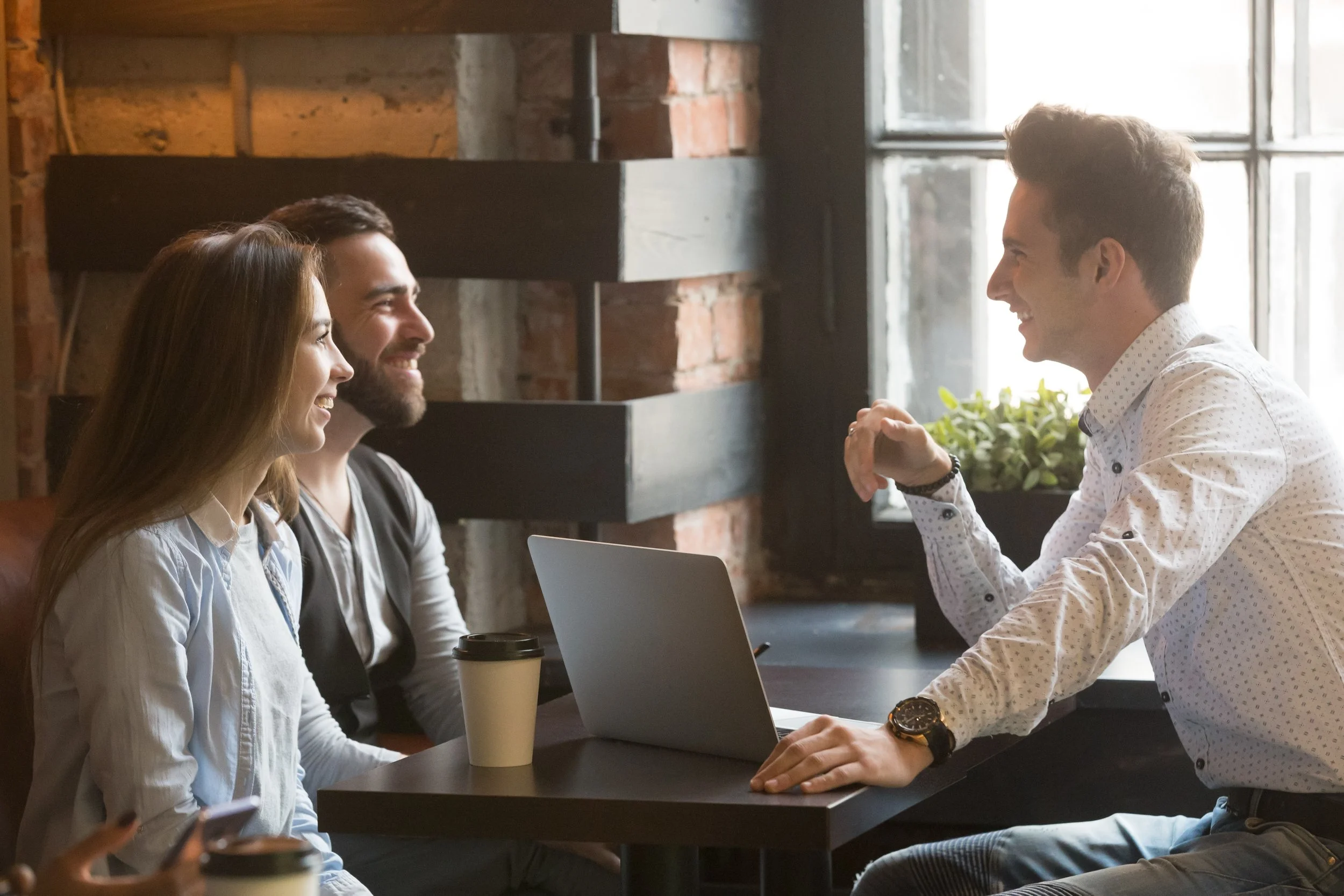 Professional branding photo of people in a business setting