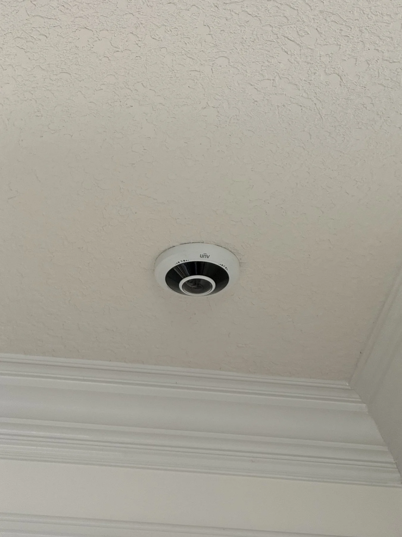 Ceiling-mounted Uniview fisheye camera.