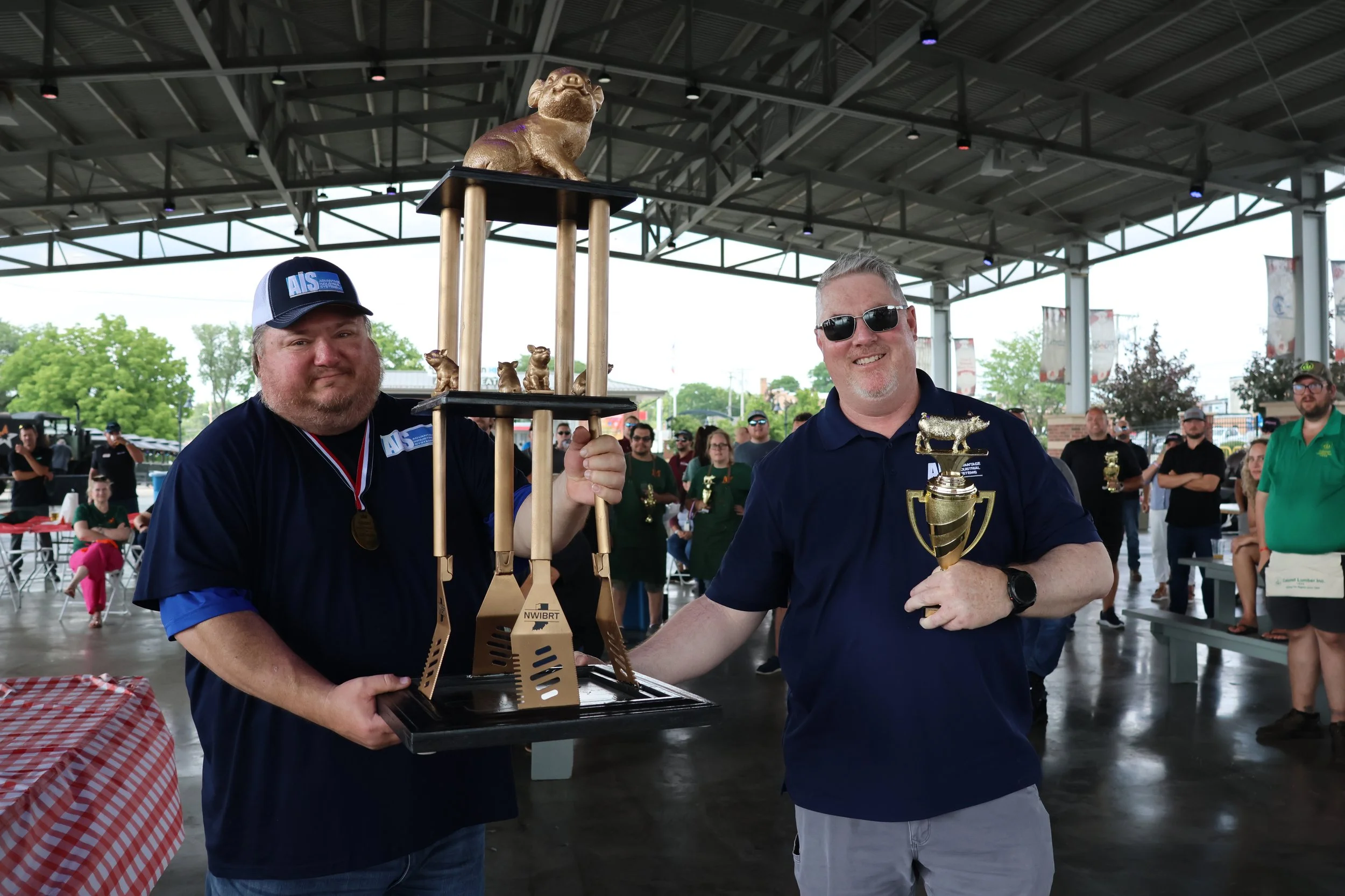 Advantage Industrial Systems receiving the 2026 NWIBRT Smoke-Off championship trophy