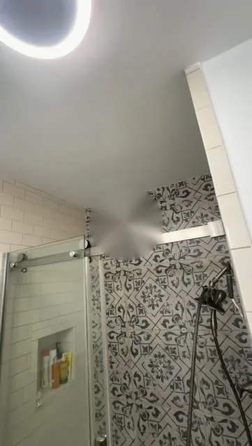 Yorba Linda bathroom after skim coat and paint, with a glass shower
