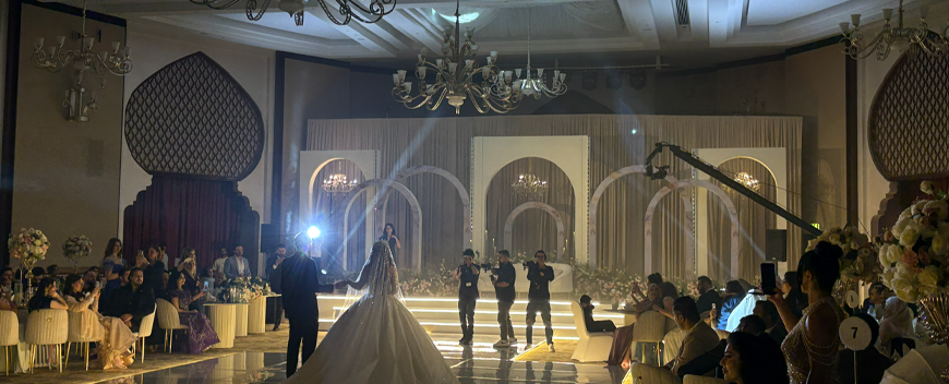 Bridal entrance lighting show in Abu Dhabi — pre-programmed beam show with crossing beams above the dance floor