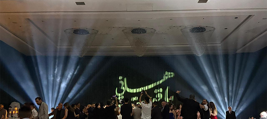 Stage lighting rental Dubai with full truss beam design at event hotel ballroom