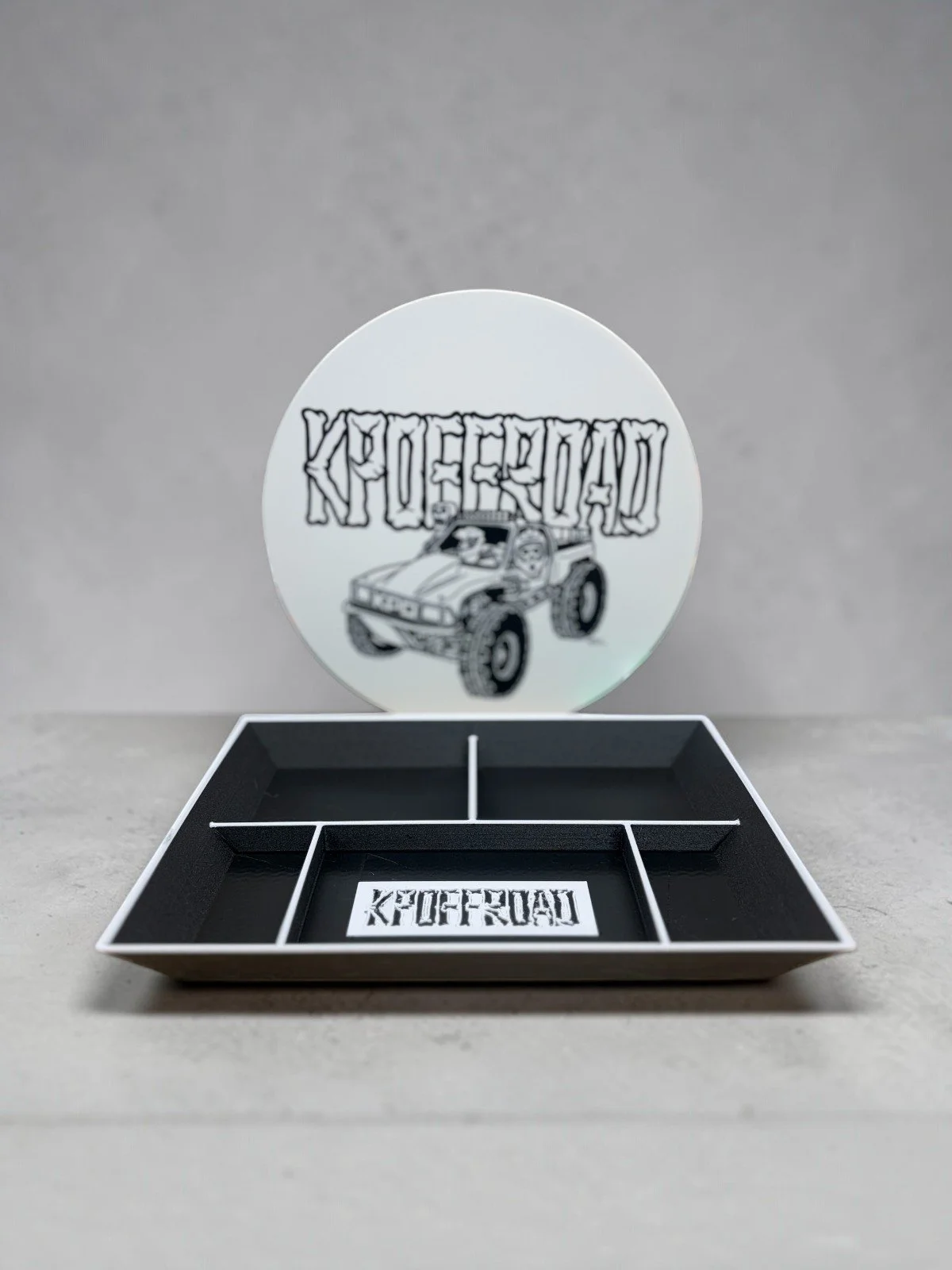 Custom 3D printed KP Offroad valet tray with a matching round off-road truck shop sign
