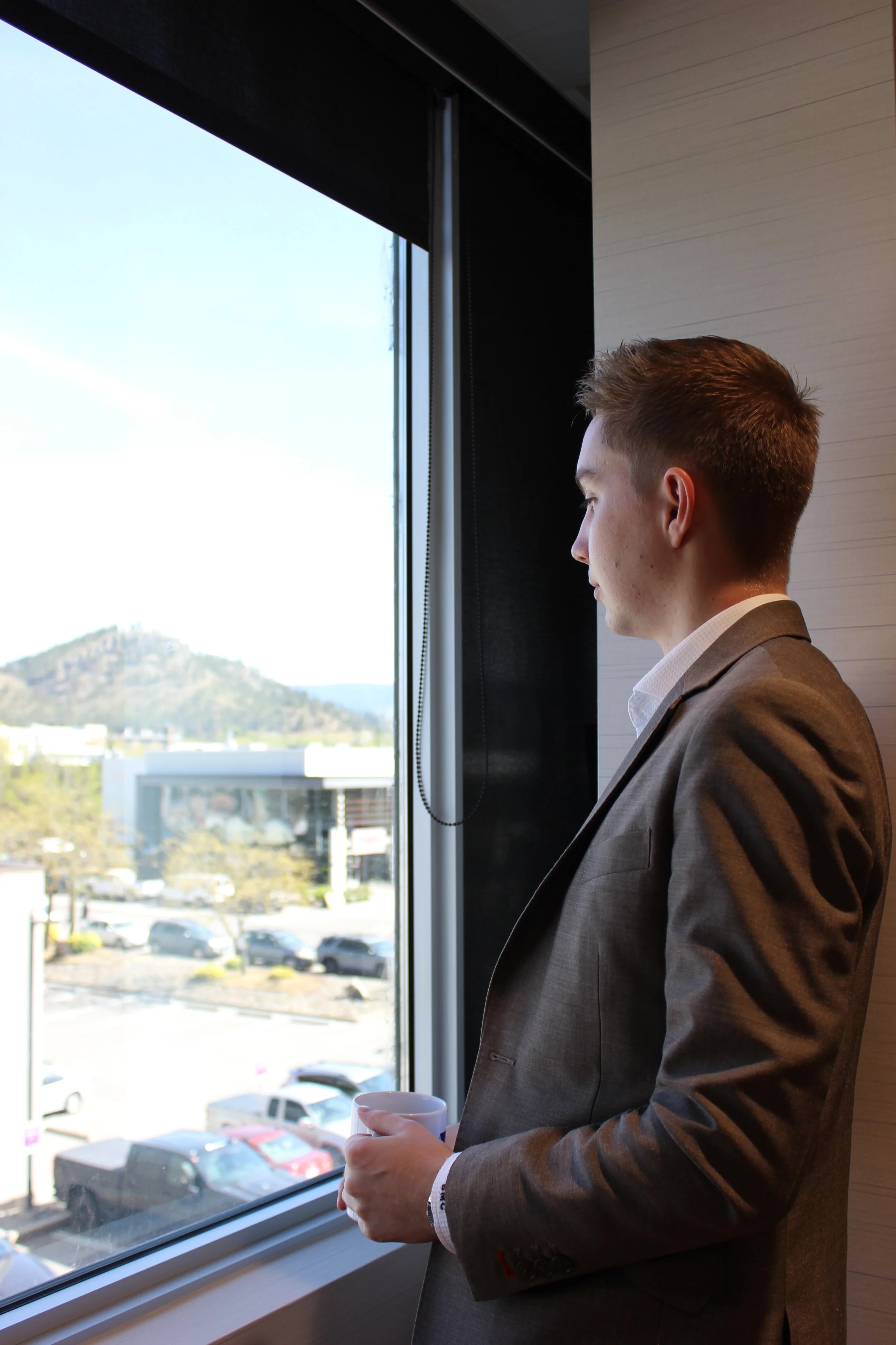 Bryan Cresswell, Kelowna financial planner, looking out over Kelowna