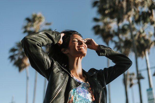 Woman smiling outdoors after PTSD treatment at Good Day Mental Health in Ogden Utah