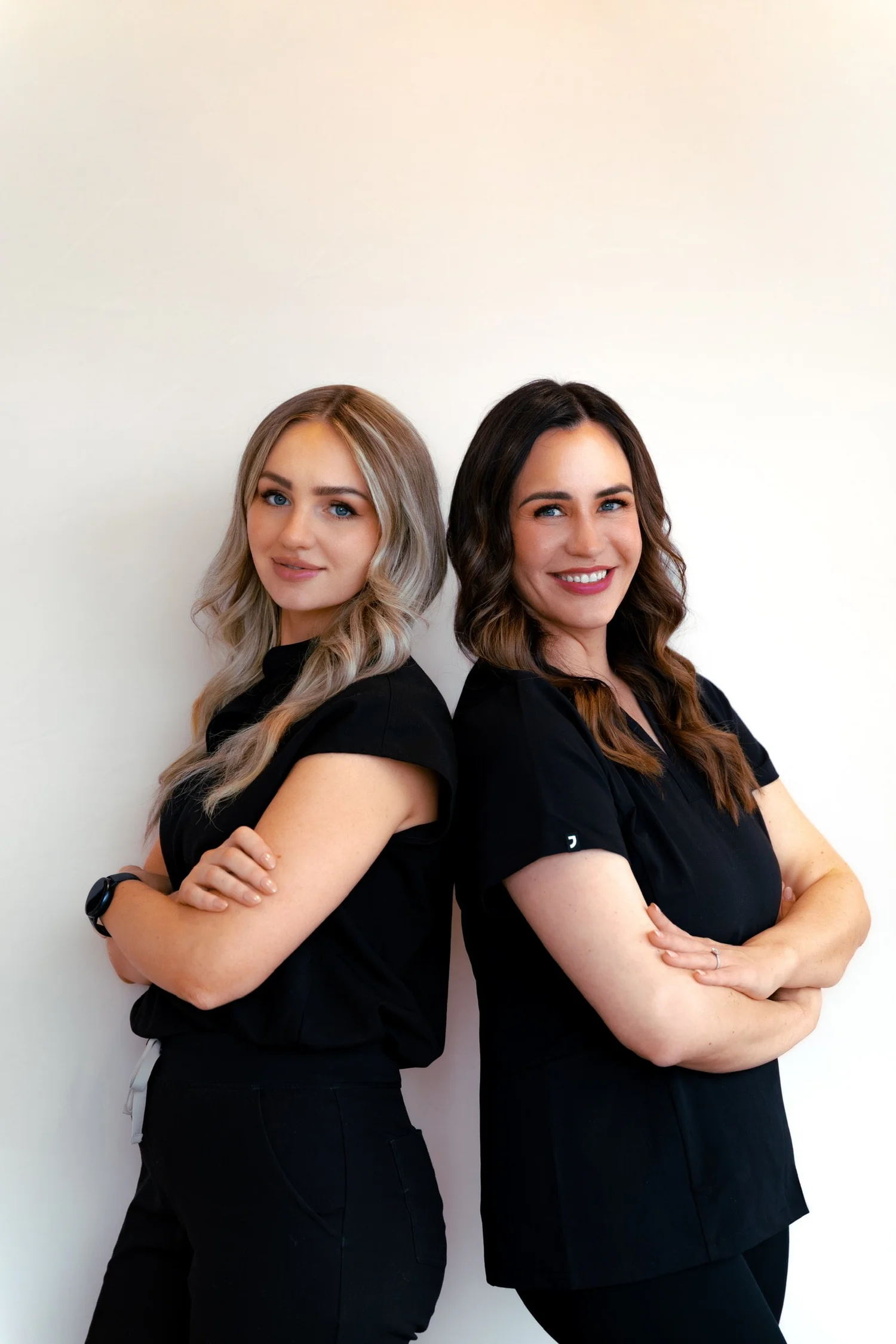 Emily Selkirk, LE, and Liliya Yanyk, RN, in the SKYN lounge