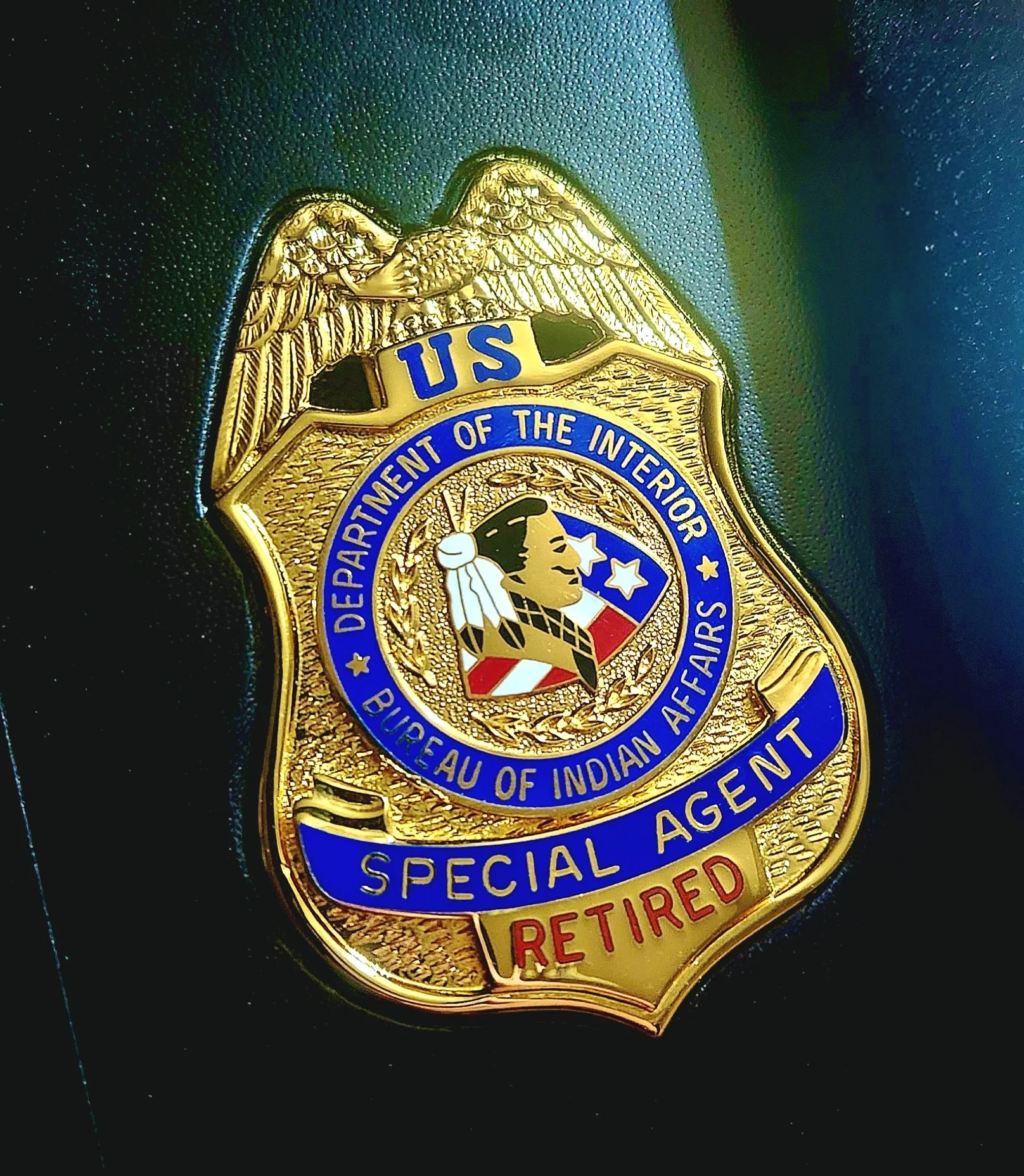 Jerin Falcon's Bureau of Indian Affairs Office of Justice Services Special Agent (Retired) badge.