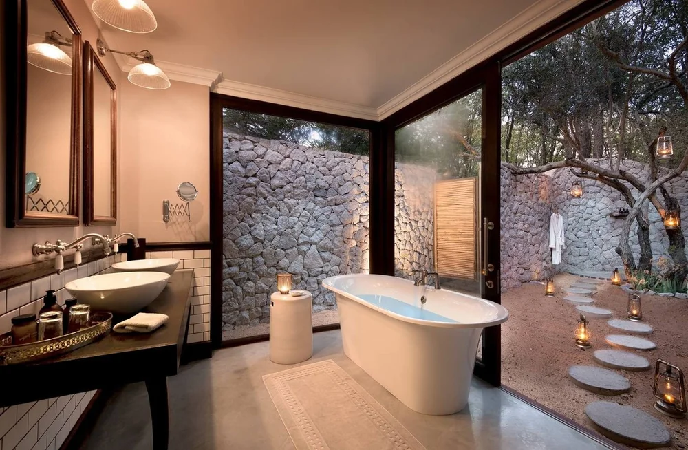 Cottage bathroom with outdoor shower