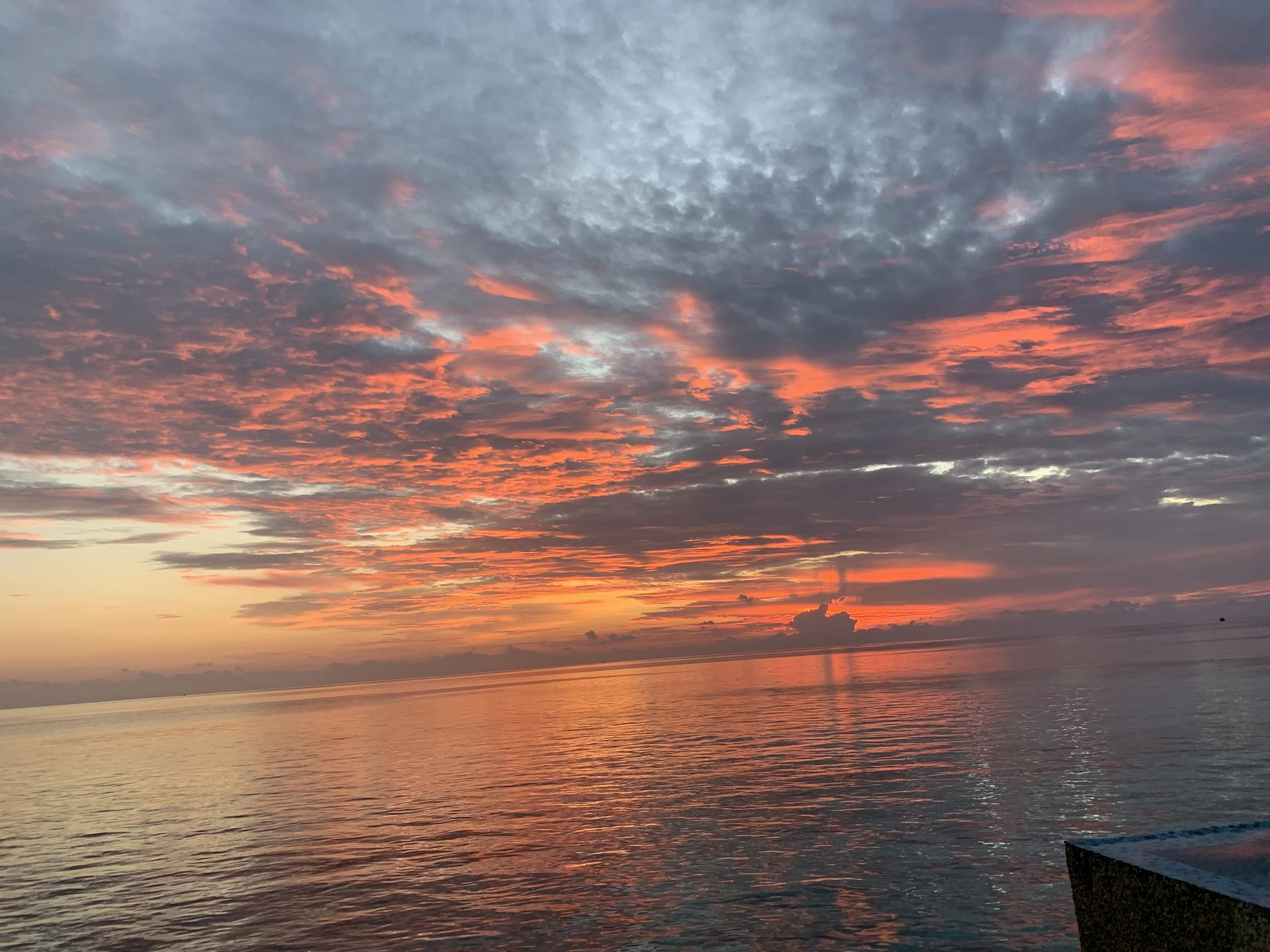 Sunset over the sea in the Maldives.