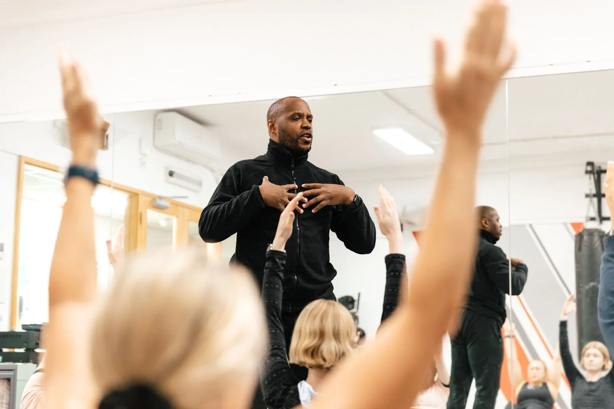 Instructor leading the class