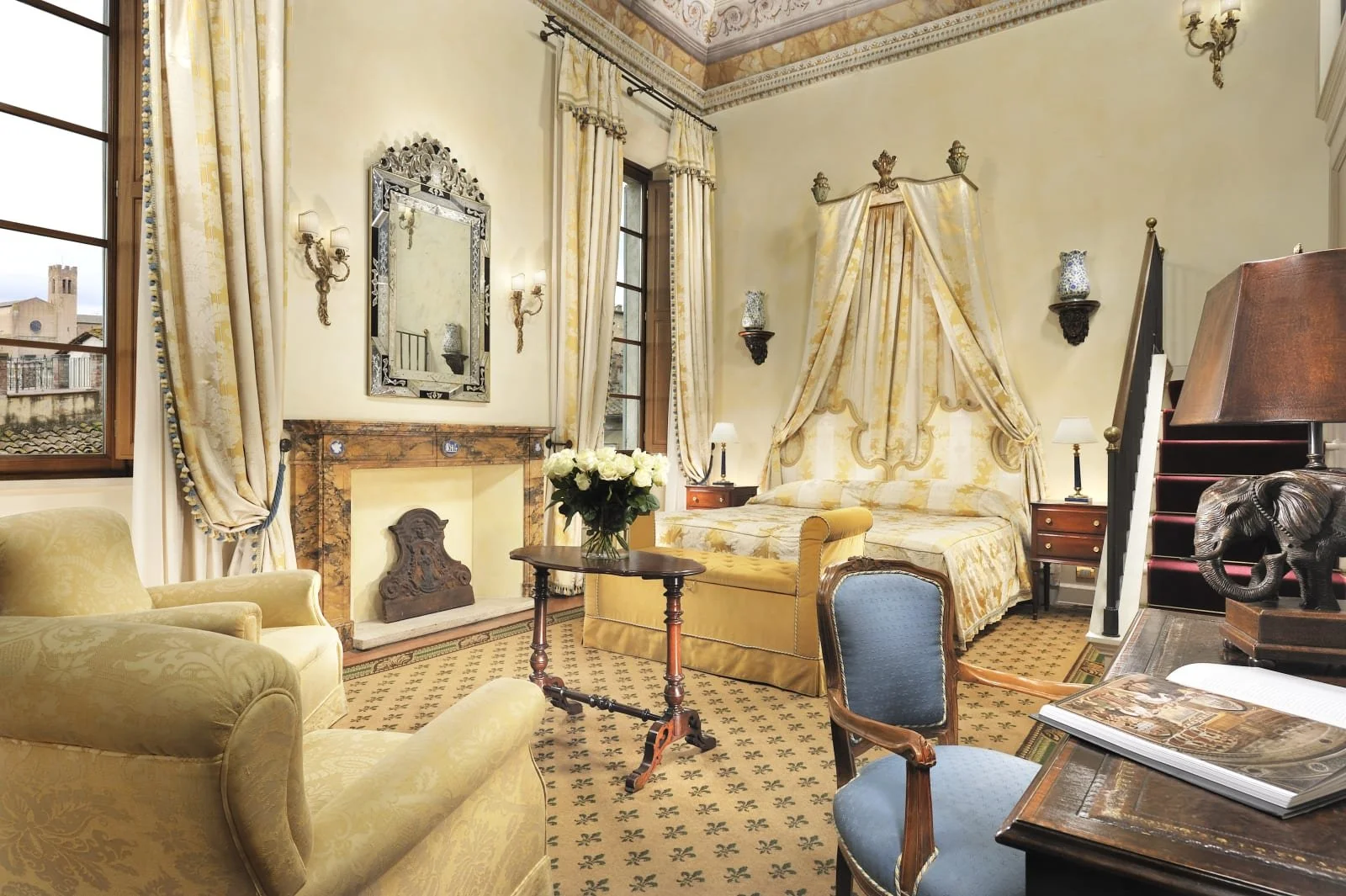 Elegant guest room at Grand Hotel Continental Siena