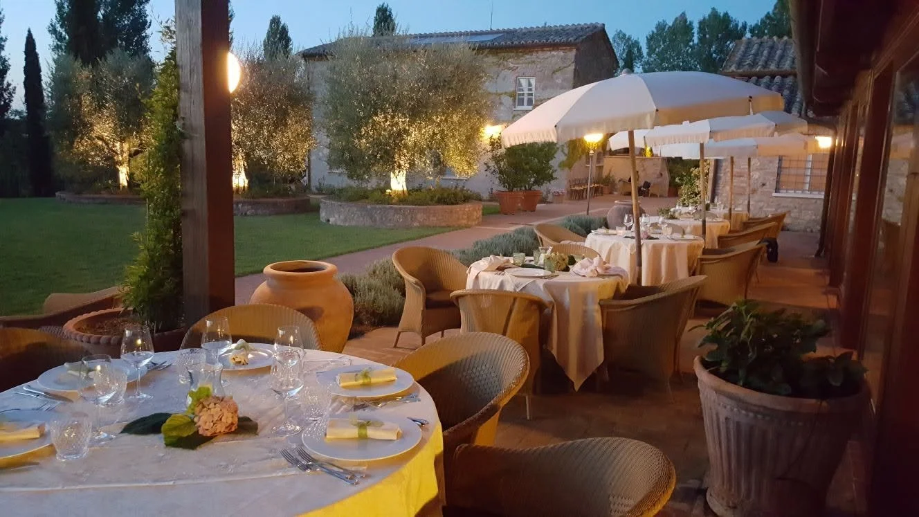 Tables set for evening dining on La Sovana’s terrace