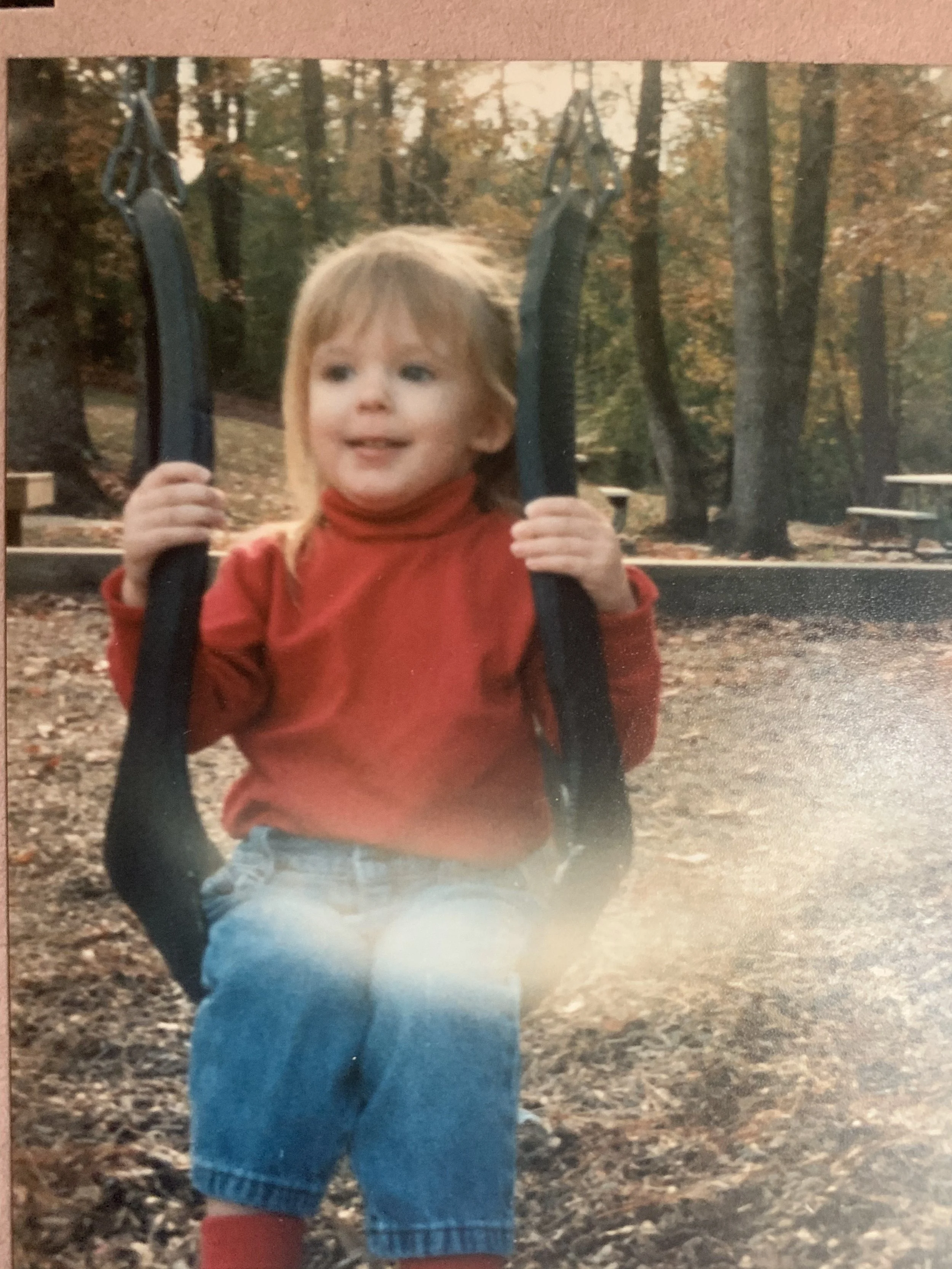 baby marci on a swing