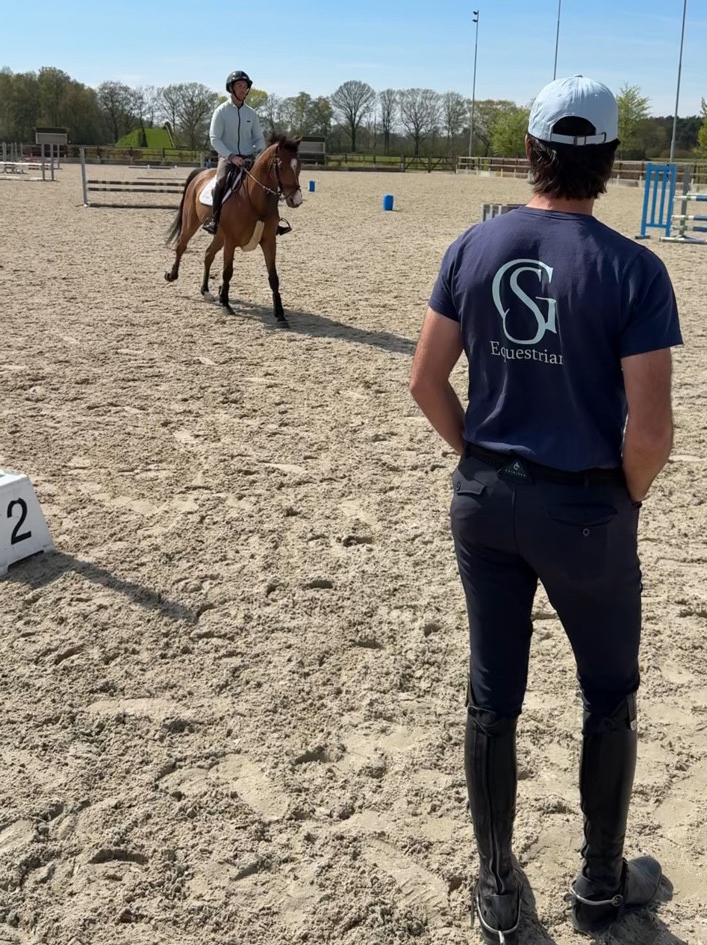 Ryan Genn coaching a horse and rider