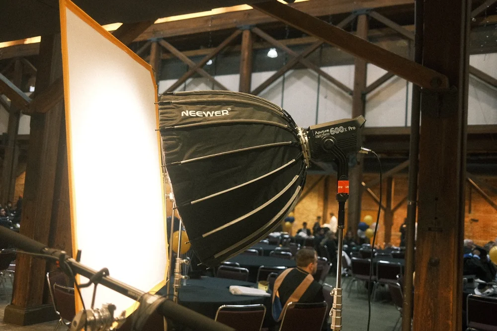 Light with a parabolic softbox at an event shoot