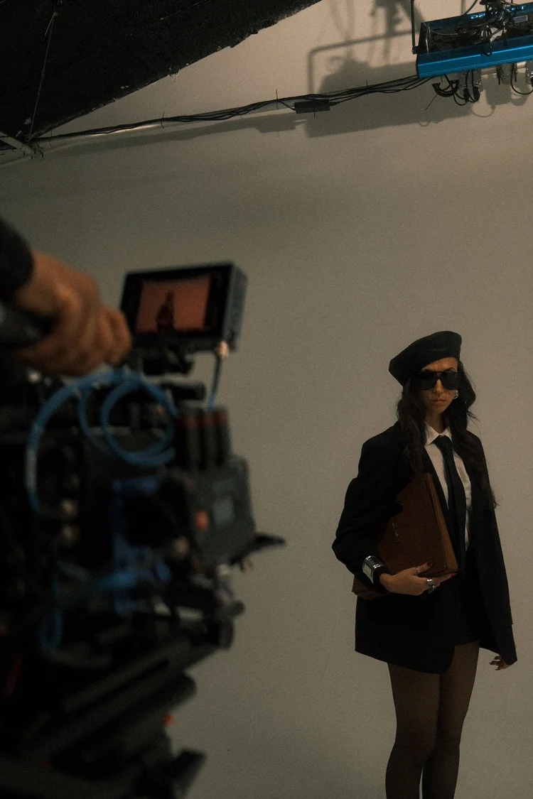 Cinema camera framing talent on a studio shoot
