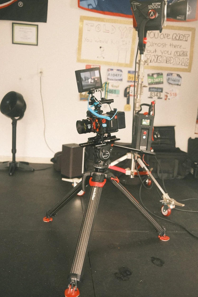 Cinema camera on a tripod in a studio setup