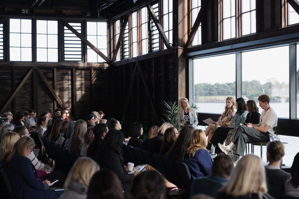 A fireside session in the Belgiorno Room with harbour views