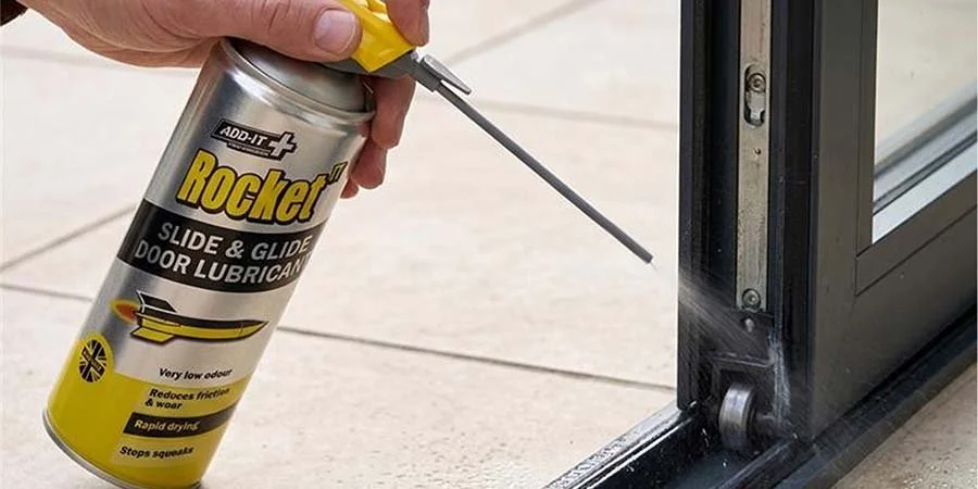Rocket TT Slide & Glide Door Lubricant Being Applied To A Sliding Door Track