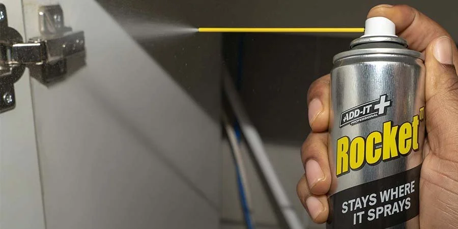 Rocket TT Super Lubricant Being Applied To A Cabinate Hinge