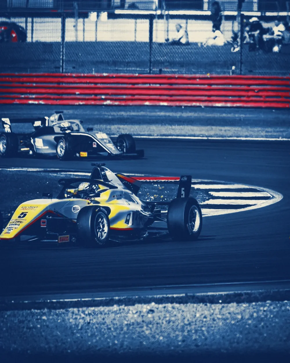 Yellow number 5 on the kerb with a blue car behind, Prussian blue cyanotype with the yellow overprinted