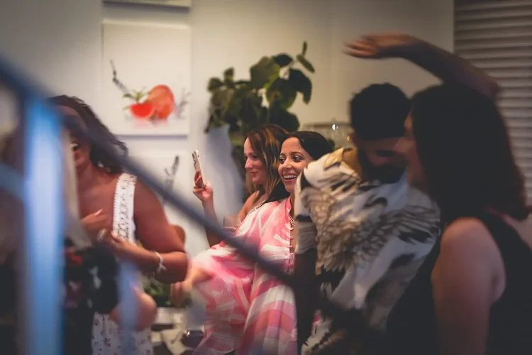 Guests dancing at the Friday night paella dinner before the Miami wedding