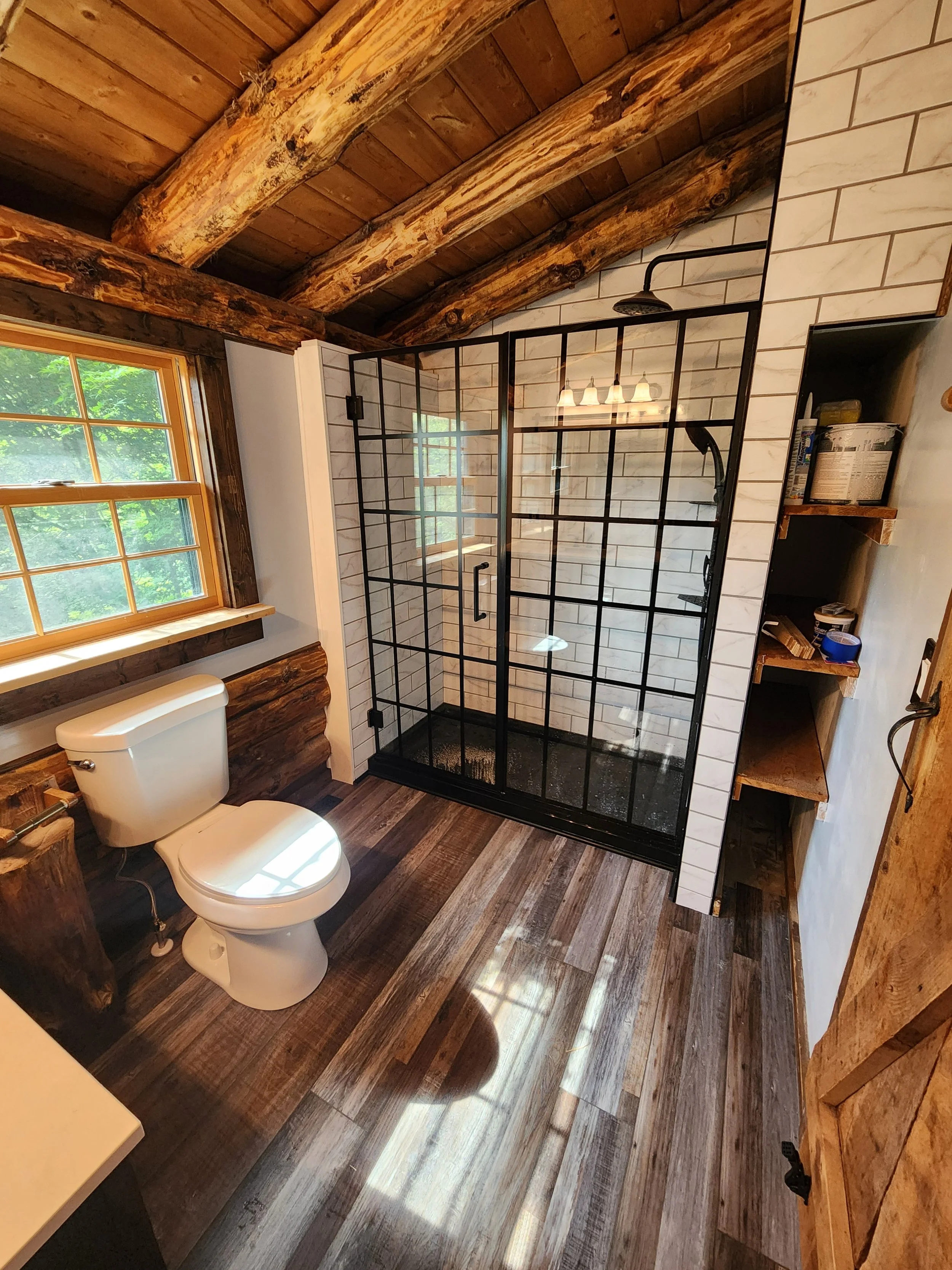 Log cabin bathroom — full room