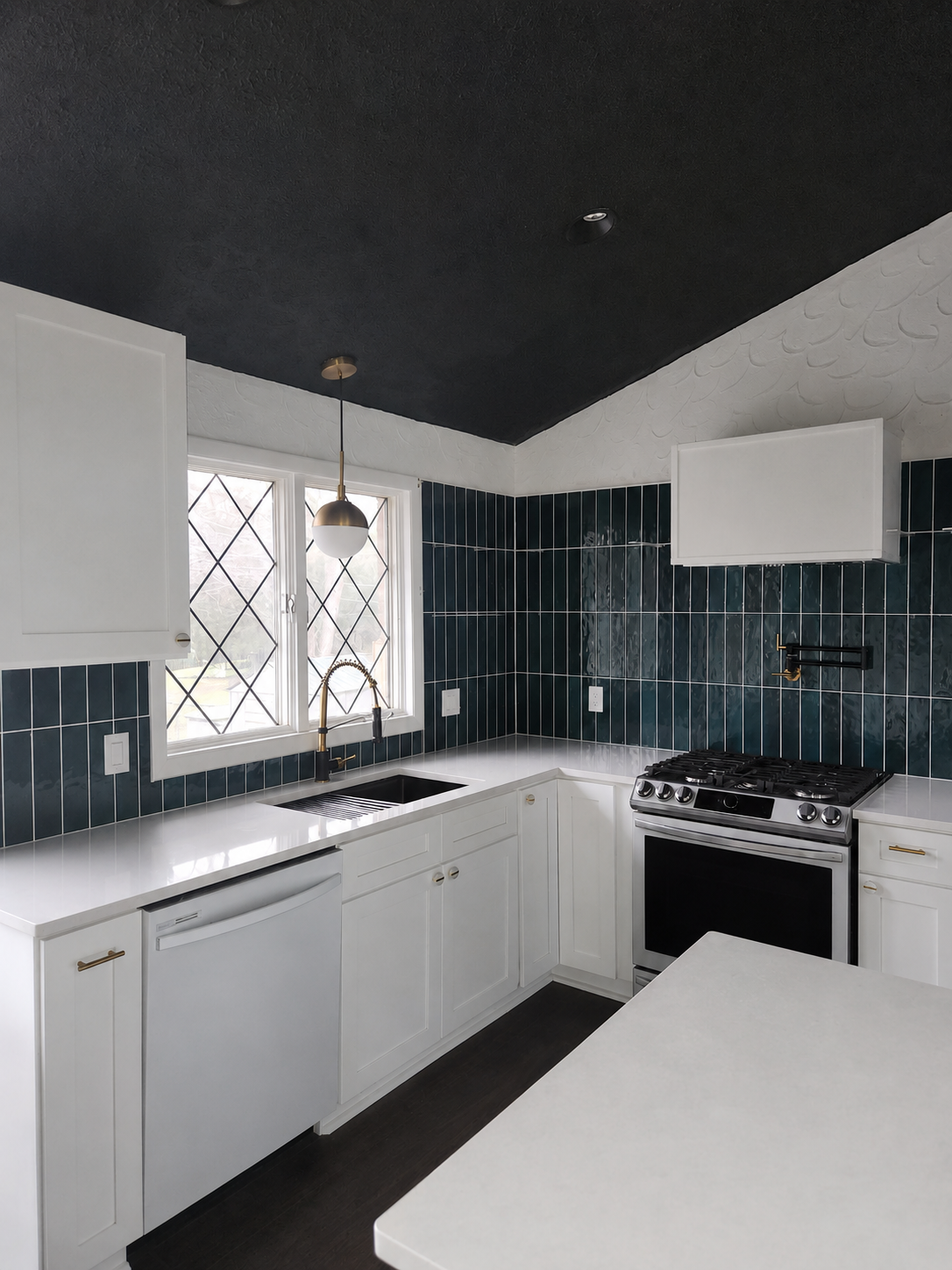 Teal kitchen — daylight