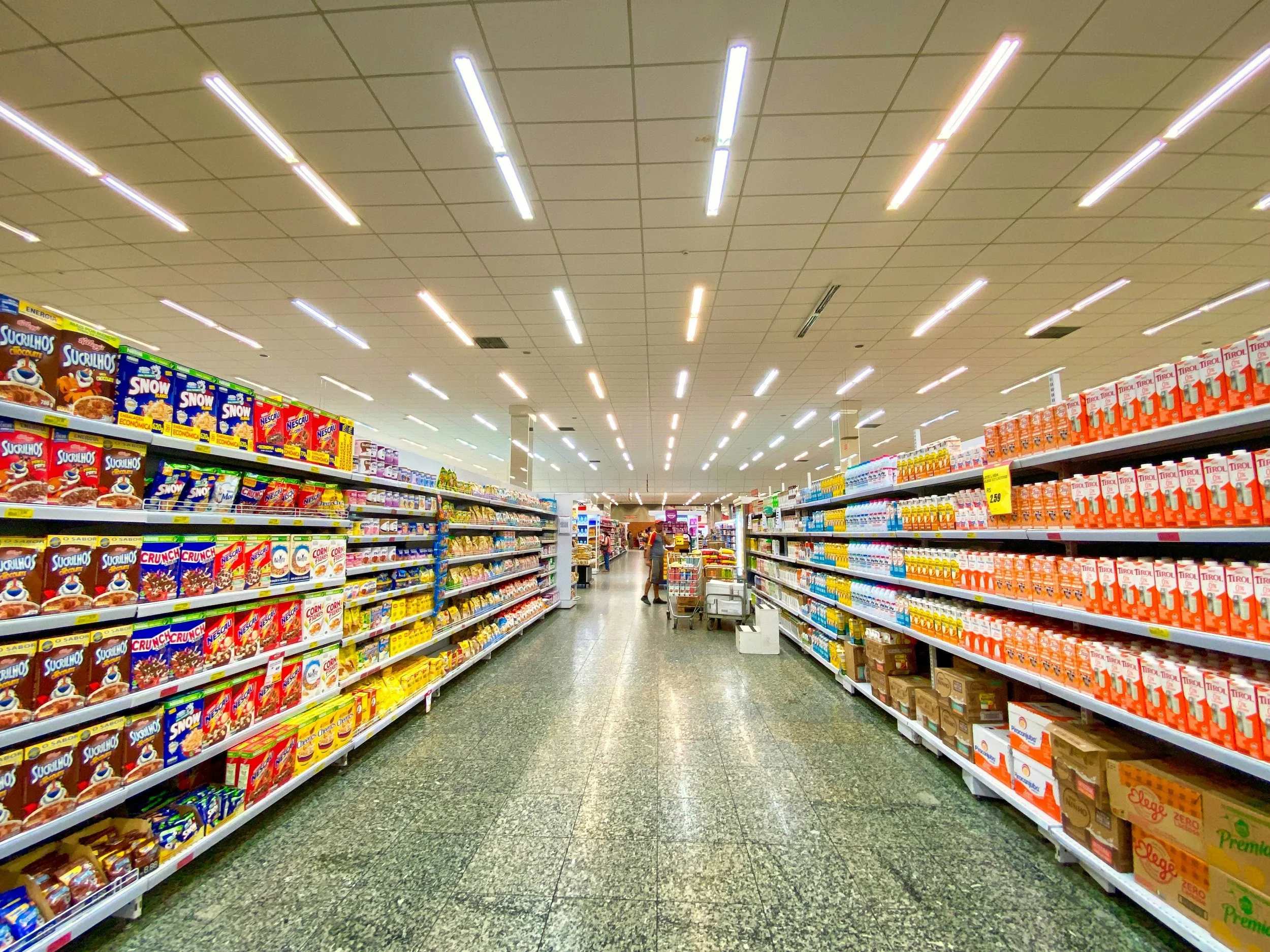 Grocery store shelves stocked with goods