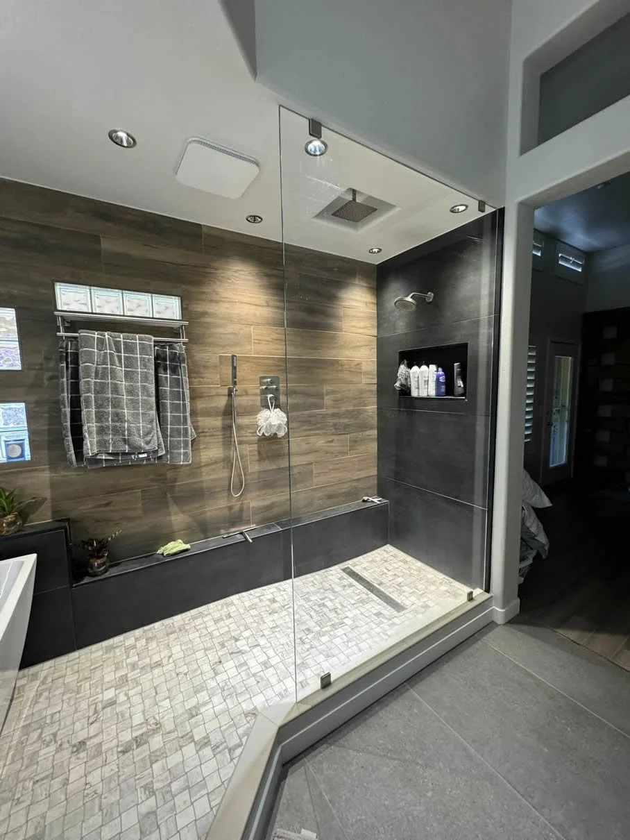 Glass shower installation with modern bathroom finish