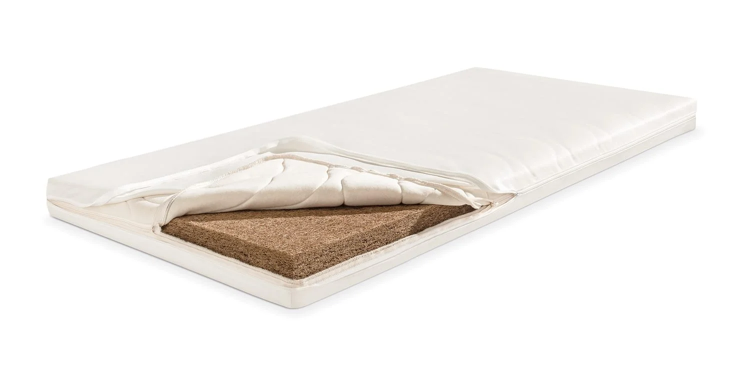 HEIDI cot mattress with the hemp cover opened to show the coconut-fibre core