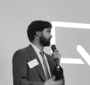 Johaan speaking on stage