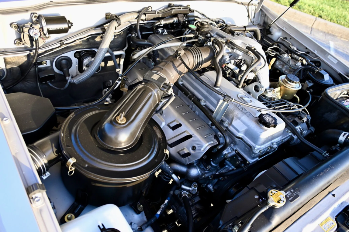 Clean engine bay of the 1997 Lexus LX450 with the 4.5-liter inline-six