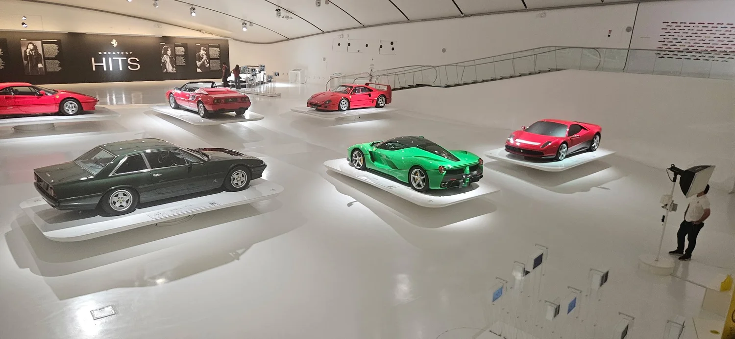 Jay Kay's green LaFerrari surrounded by red Ferraris in the Greatest Hits exhibition