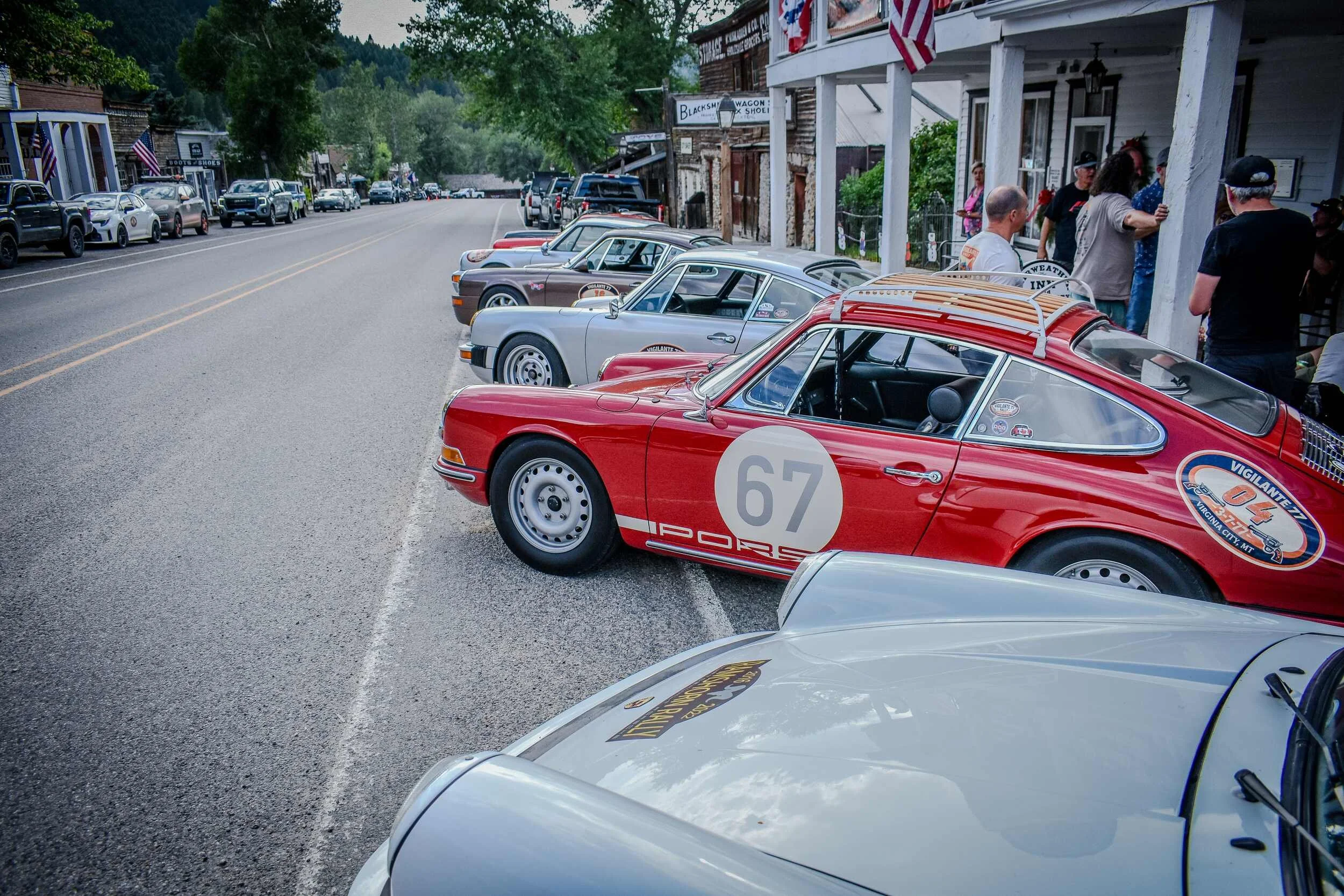Dusty rally Porsches lined along Wallace Street in Virginia City