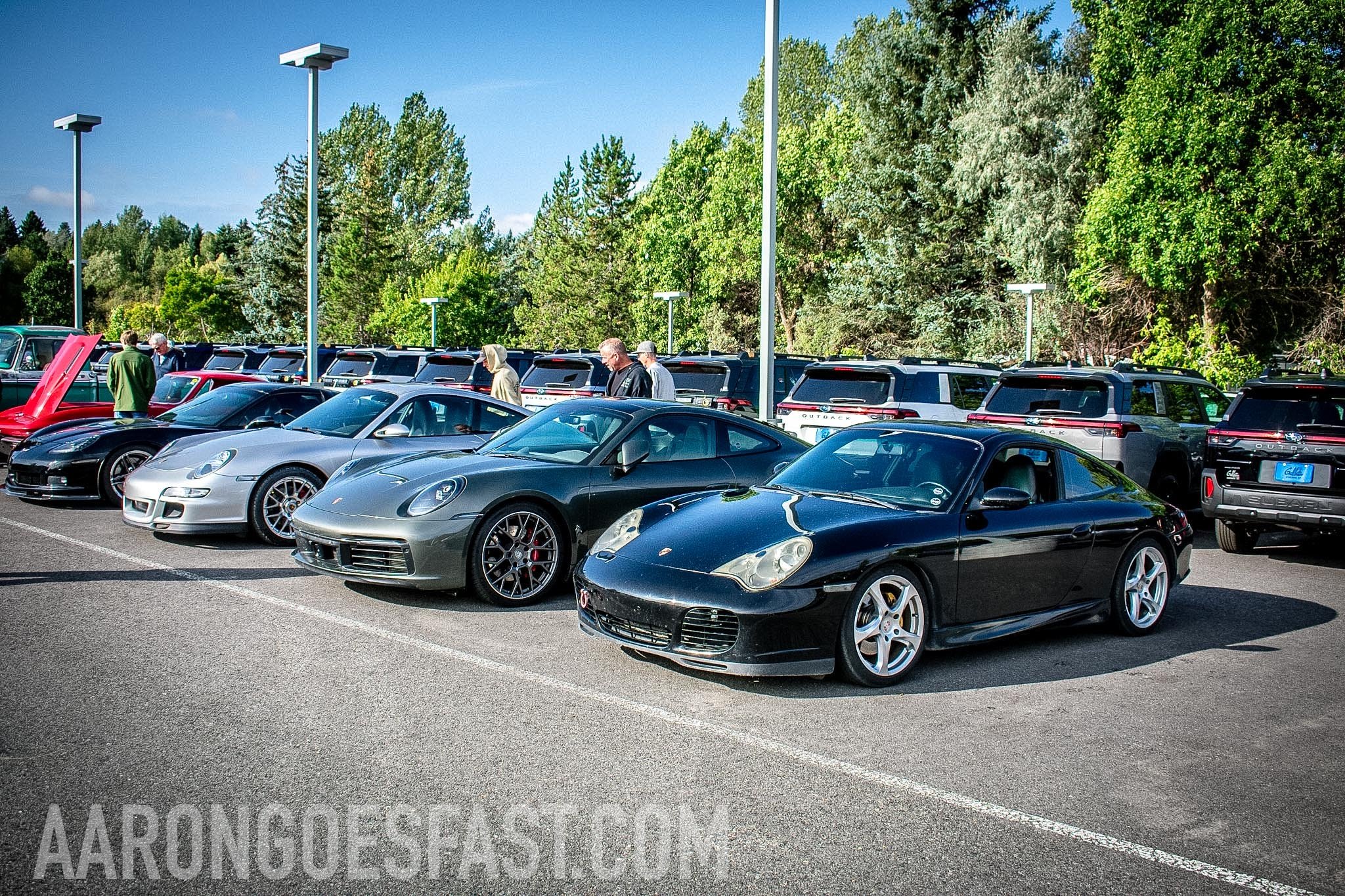 Porsches lined up at Ressler Cars and Coffee