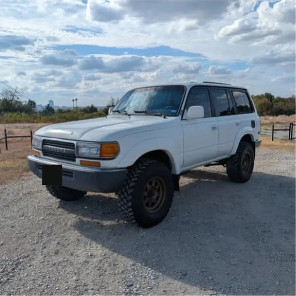 White 1991 Toyota Land Cruiser FJ80 on bronze Method wheels