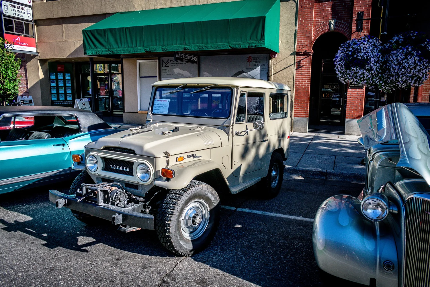 Tan Toyota FJ40 Land Cruiser parked at Cruisin on Main in Bozeman