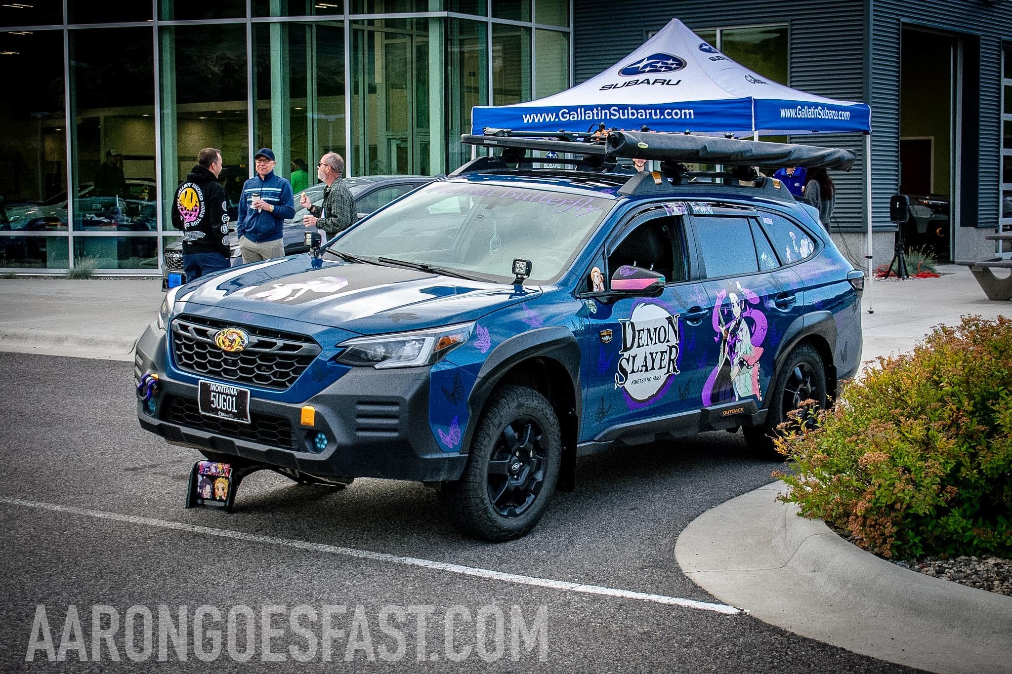 Subaru wrapped in a full anime-character itasha livery